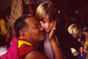 Lama Yeshe with Child